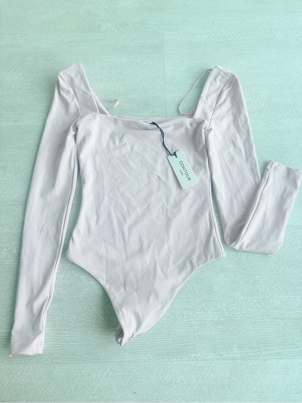 Aritzia Pink Long-Sleeve Bodysuit One-Piece